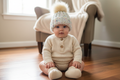 Baby wearing Fruit Salad Baby Beanie with clothes