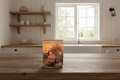 Pink House candle on farmhouse kitchen table